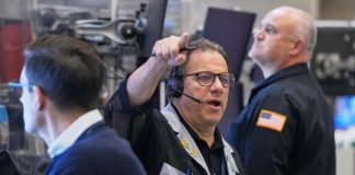 Stock market sinks as AI and interest rate worries grip investors