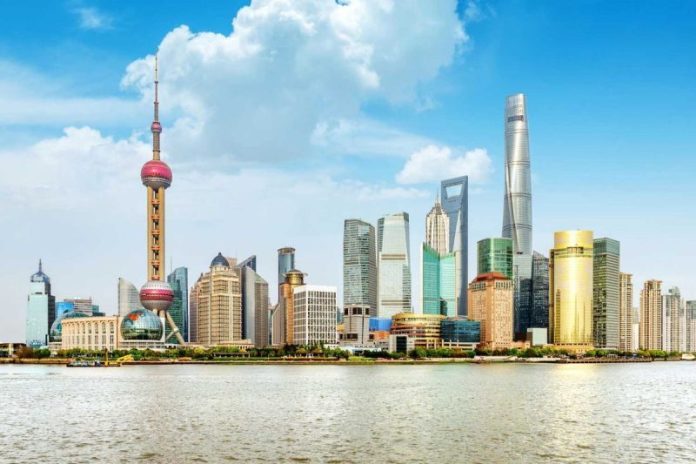 <strong>The valuation of China’s Zijin Mining Group (OTC Pink:ZIJMF,HKEX:2899,SHA:601899) has topped US$100 billion for the first time despite the firm’s delayed initial public offering (IPO). </strong>
Shares of the Fujian-based miner closed at a record high in Shanghai on Thursday (September 25), giving the company a market capitalization of about 732 billion yuan (around US$132.4 billion), according to a Bloomberg report.
That puts Zijin just behind global heavyweights Rio Tinto (ASX:RIO,NYSE:RIO,LSE:RIO), worth roughly US$112 billion, and BHP (ASX:BHP,NYSE:BHP,LSE:BHP) at about US$140 billion.
Founded by geologist Chen Jinghe in the 1980s with a small gold mine in Southeastern China, Zijin concentrated its expansion heavily on gold and copper, which together made up 77 percent of its revenue in the first half of 2025.
That focus has paid off handsomely in the current market climate, with copper prices hitting record averages and gold smashing through historical highs. Gold has been trading at unprecedented levels throughout September, with futures opening on Thursday at US$3,768.30 per ounce, up 1 percent from the previous day’s close of US$3,732.10.
Prices have consistently held above US$3,700 since September 22. Earlier this month, bullion reached an all-time peak of US$3,788.33, eclipsing the inflation-adjusted record set in January 1980.
Analysts attribute the rally to a weaker US dollar and widespread expectations of further US interest rate cuts.
Gold’s strength has reinforced Zijin’s plans to spin off and list its overseas gold assets.
Zijin Gold International, which controls the company’s non-China gold mines, is seeking to raise about US$3.2 billion in what would be the world’s second largest IPO of 2025. The Hong Kong listing was initially scheduled for September 29, but has been pushed back a day to September 30 after Super Typhoon Ragasa battered the city.
The delay stems from Hong Kong exchange rules that automatically extend IPO subscription deadlines when a No. 8 or higher storm warning coincides with the final morning of the retail order period. Because Ragasa effectively shut down financial activity on Wednesday (September 24), Zijin’s offering was forced to adjust by 24 hours.
Despite the storm disruption, Zijin’s offering is expected to draw strong demand. Investors have been closely tracking the company’s trajectory, noting its ability to align growth with bullish commodity cycles.
Market observers say the IPO will also test investor appetite for large-scale resource listings in Hong Kong, which has seen a slowdown in new deals amid geopolitical tensions.
A US$3.2 billion raise would make Zijin Gold’s debut the largest in the city this year and second worldwide.
<strong>Securities Disclosure: I, Giann Liguid, hold no direct investment interest in any company mentioned in this article.</strong>
This post appeared first on investingnews.com